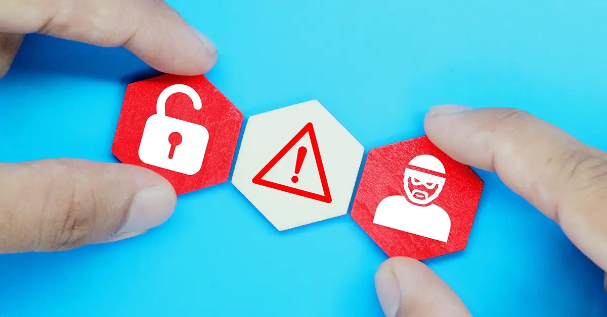 Fingers aligning tiles with website security icons